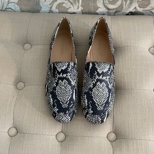 Animal print Coach loafers.